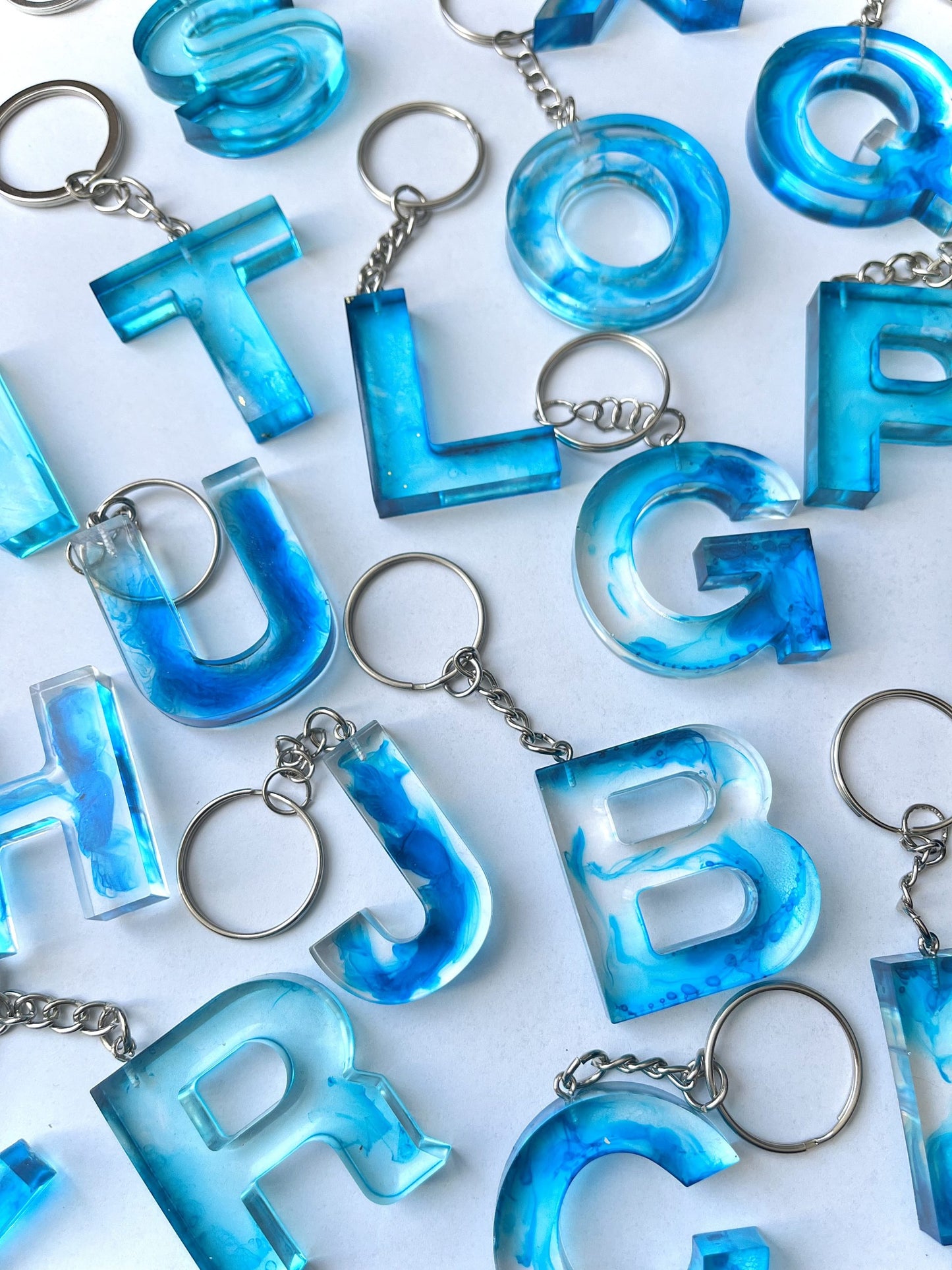 Porte clé lettre fumée bleu