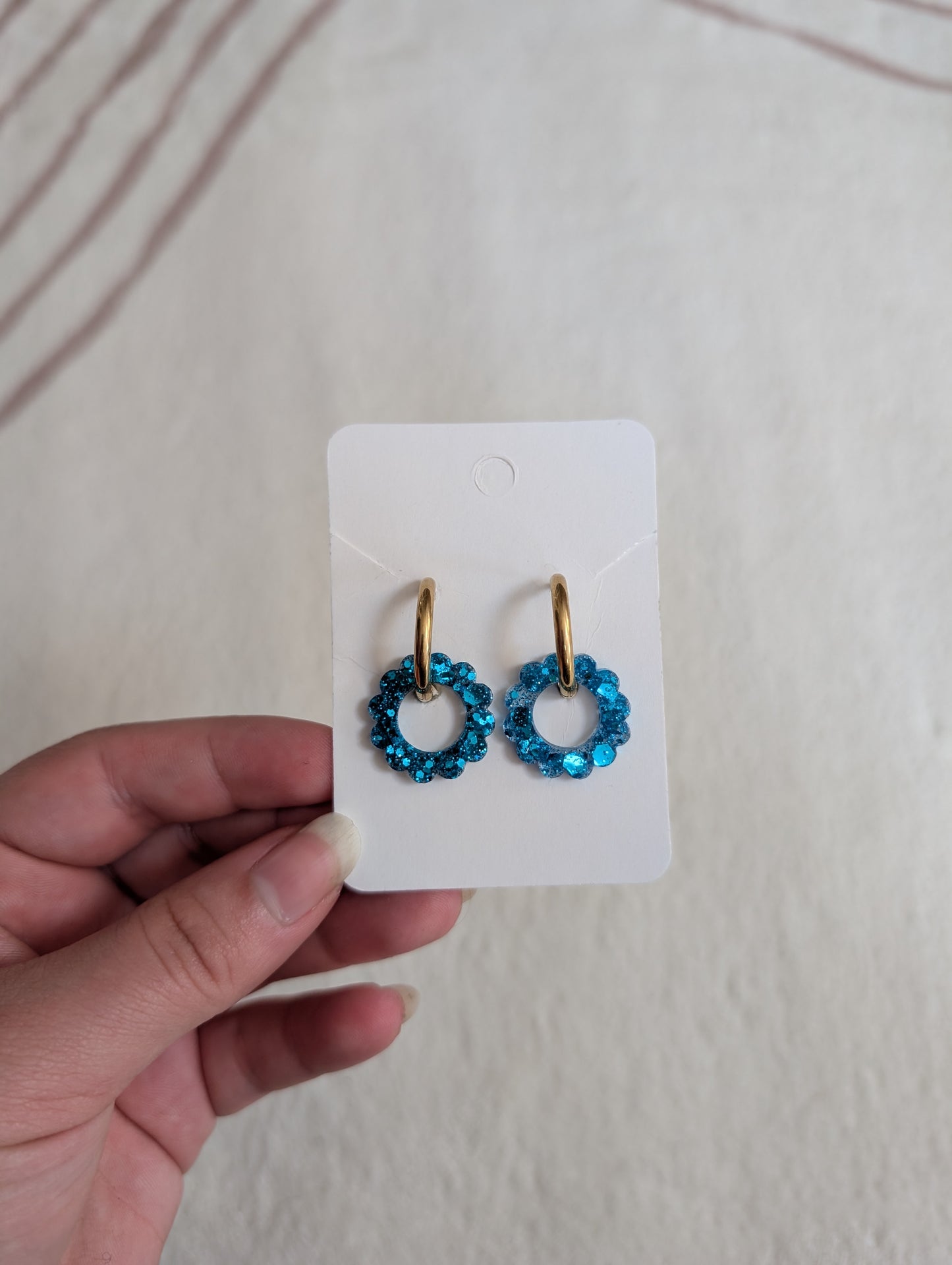 Pampille bleu à paillettes