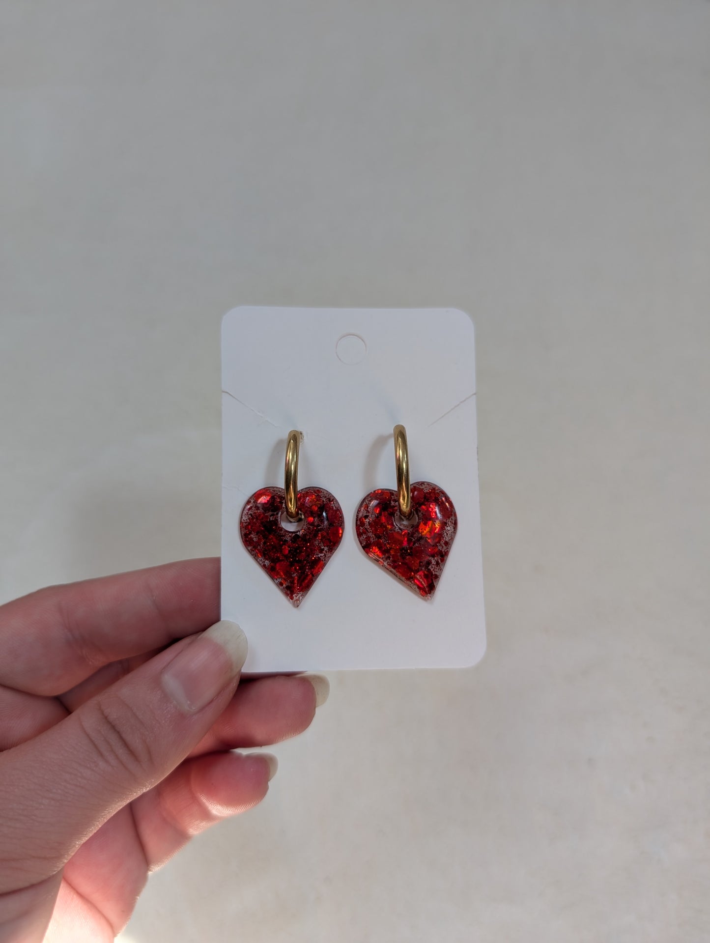 Pampille rouge à paillettes