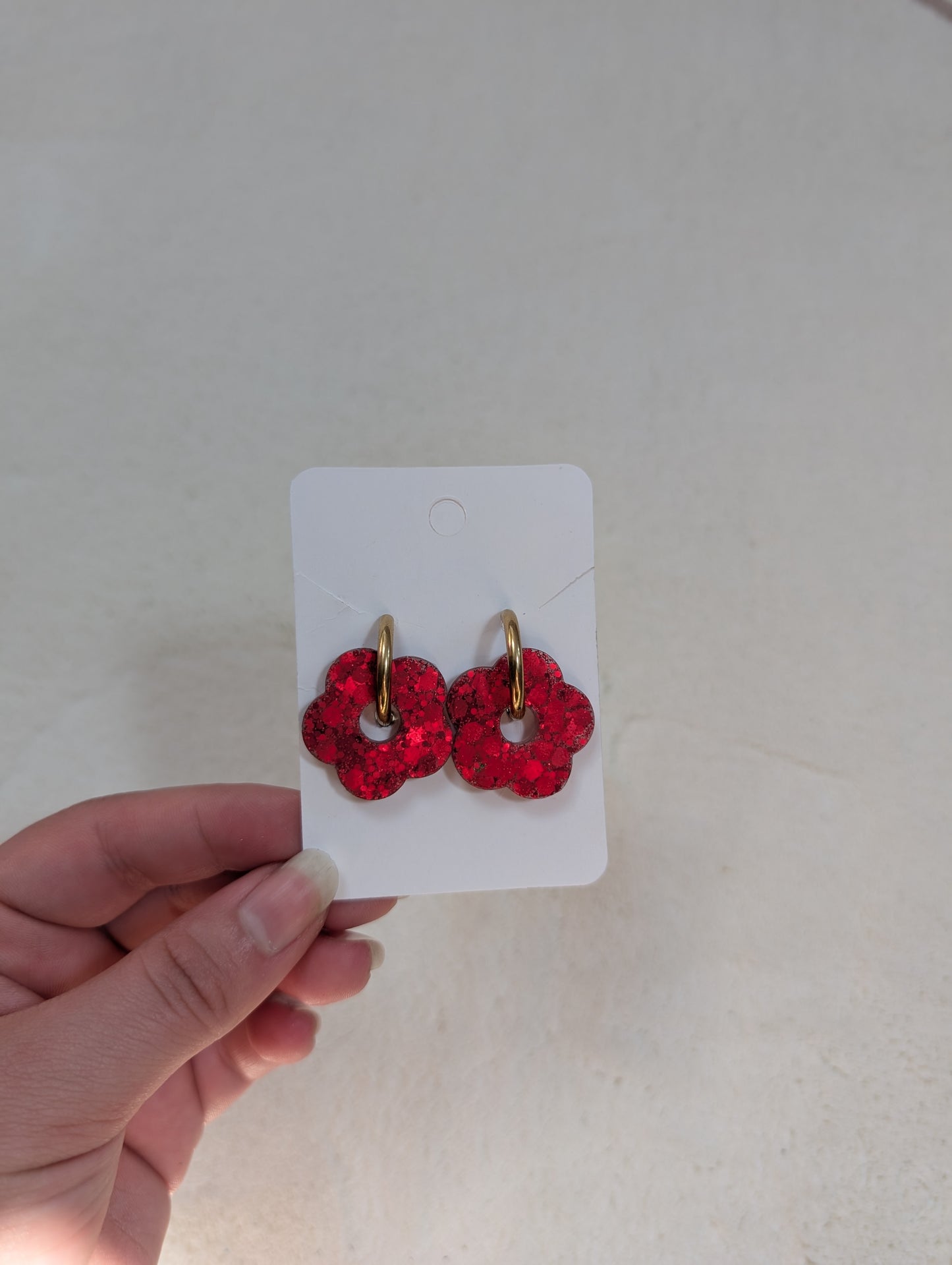 Pampille rouge à paillettes