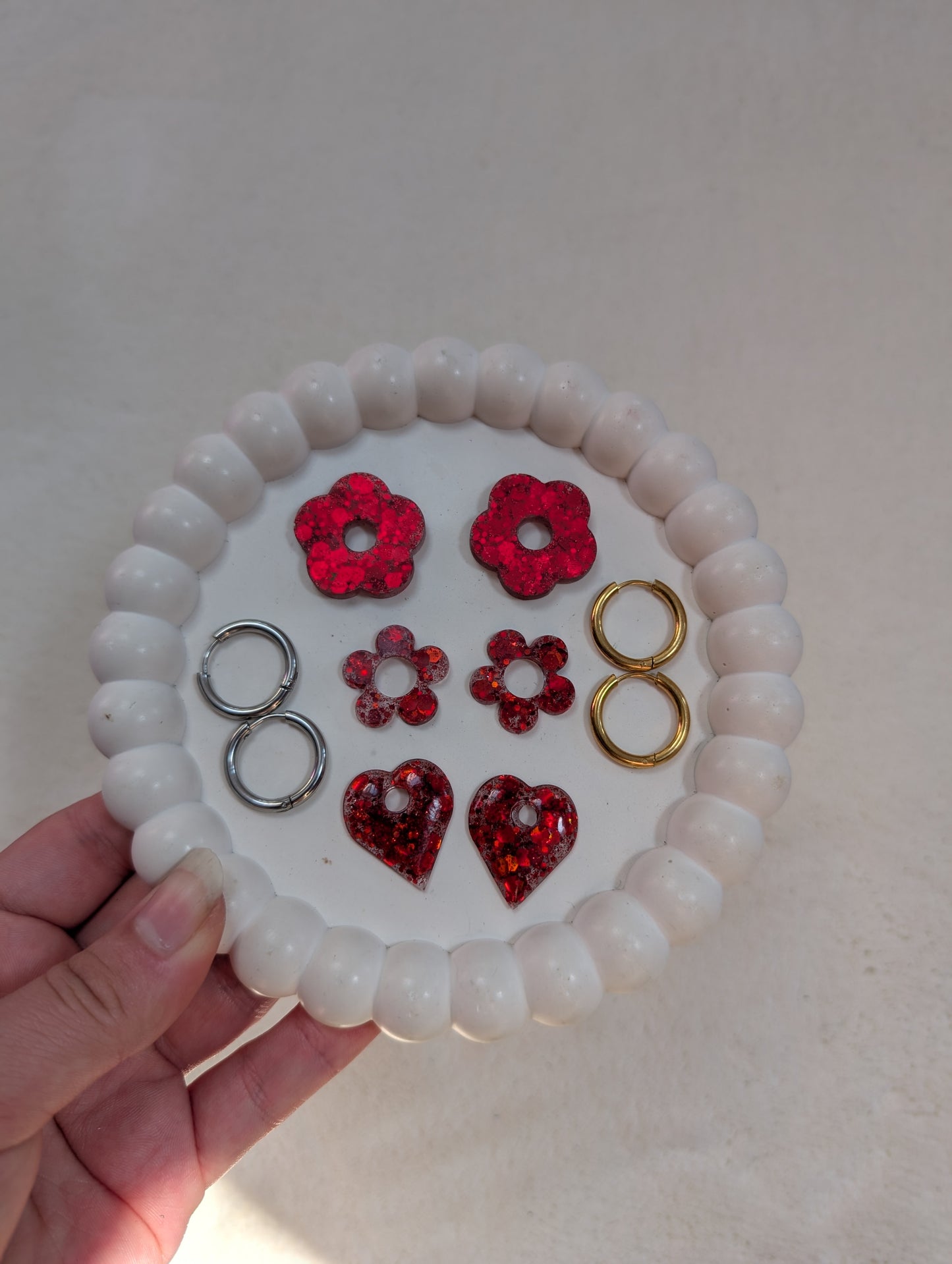 Pampille rouge à paillettes