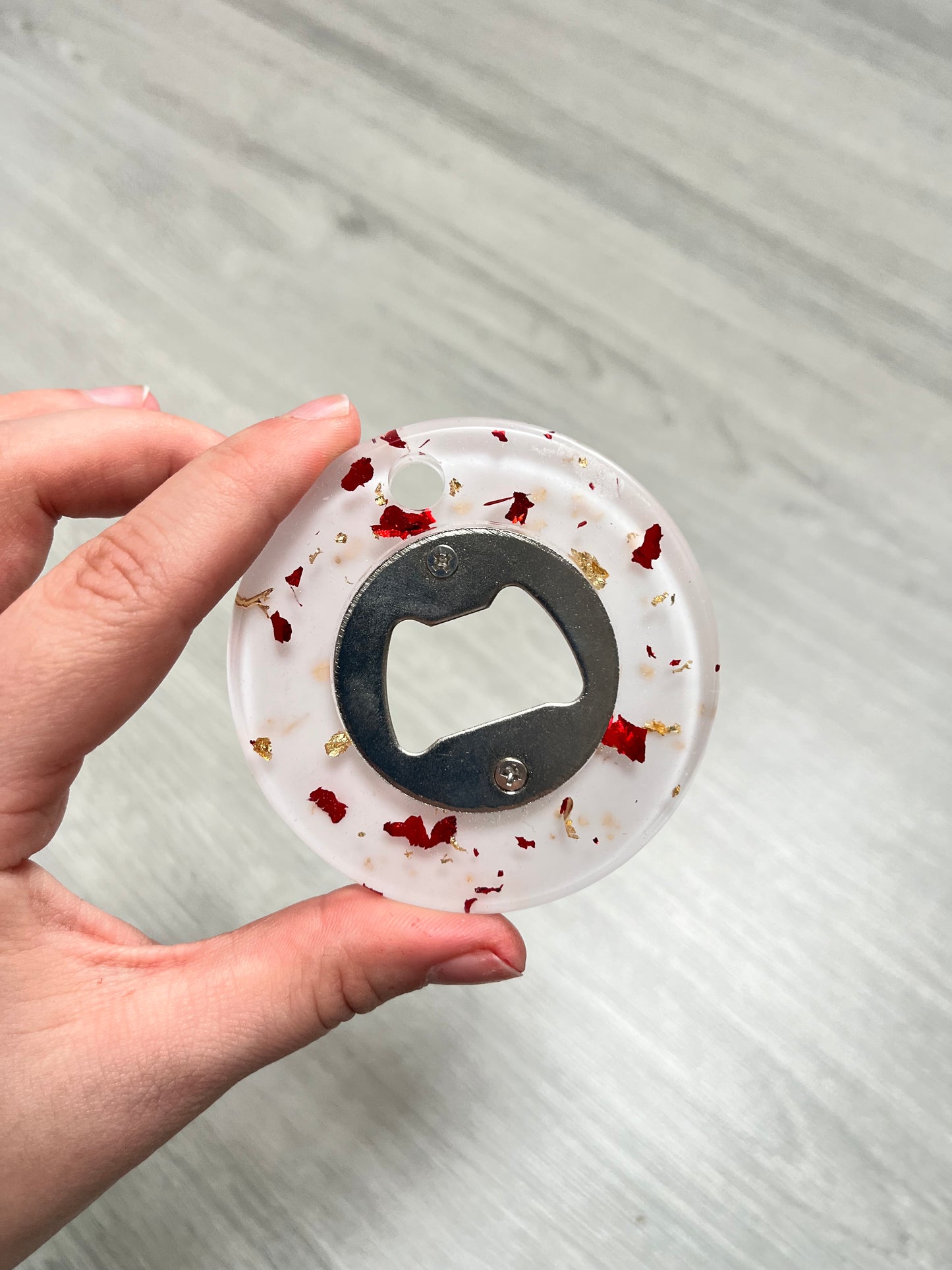 Décapsuleur rond blanc transparent et rouge