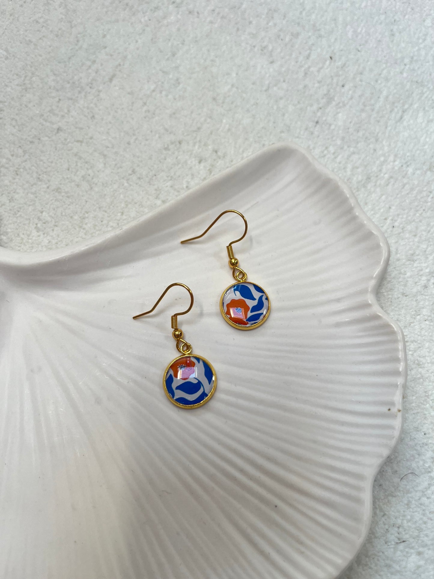 Boucle d’oreille motif bleu et orange