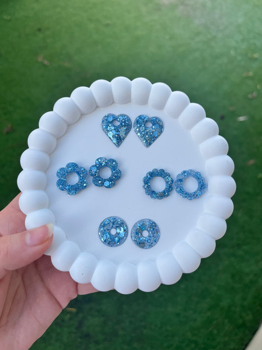 Pampille bleu clair à paillettes