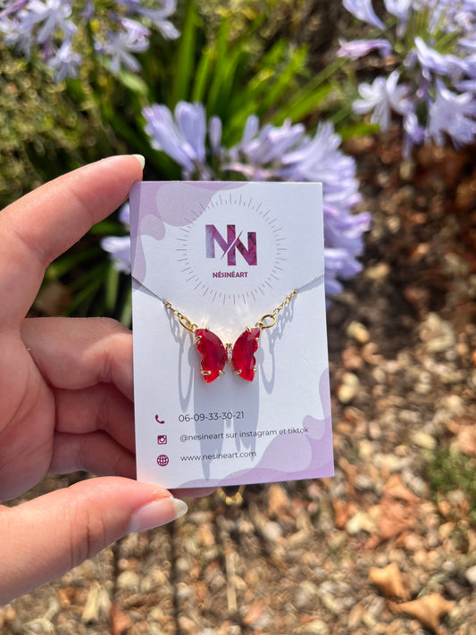 Collier papillon rouge